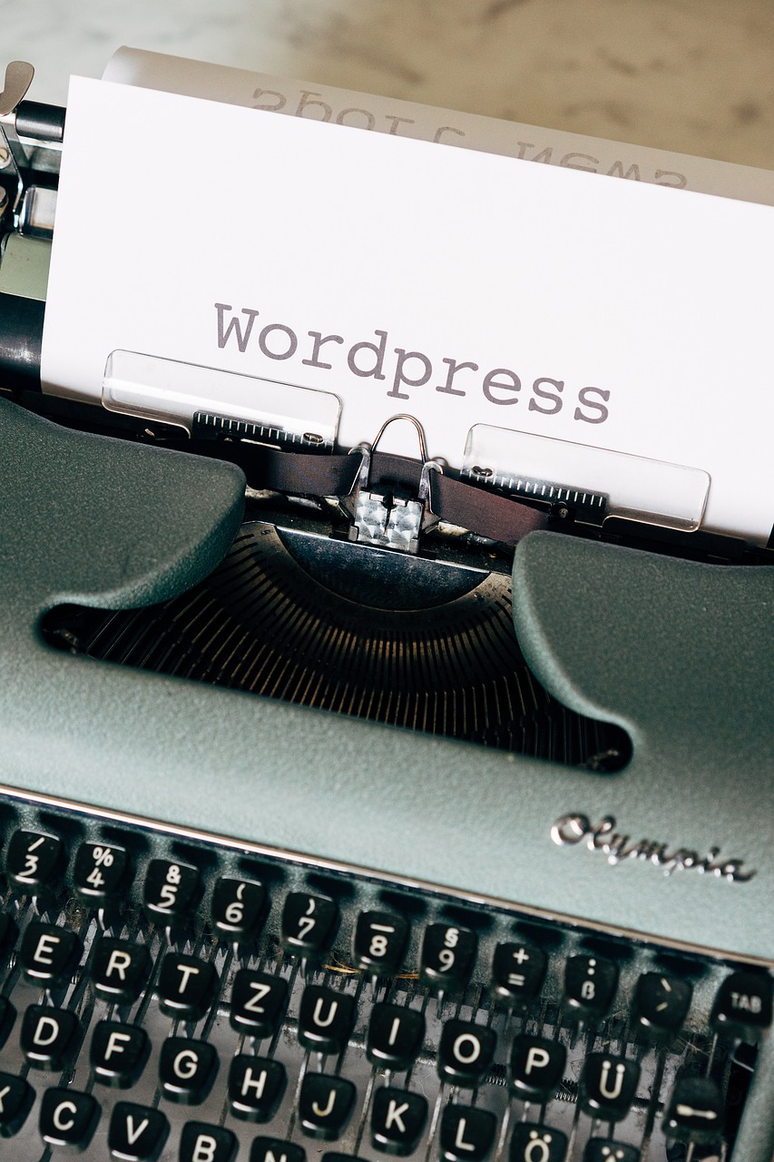 Image of Typewriter with the word wordpress written on it. Representing how to duplicate a wordpress page using elementor